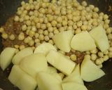 A picture of step 10 of Indian Home-style Curry with Potatoes and Chickpeas.