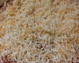 A picture of step 5 of 7ish Layer Taco dip!!.