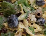 A picture of step 4 of Olive and Sundried Tomato Salad.