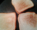 A picture of step 1 of Baked beans on toast with egg.