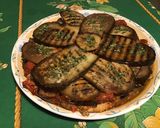 Une image de l'étape 11 de Aubergines grillées façon gâteau aux tomates, farce au chapon, pesto et emmental.