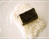 A picture of step 2 of Mr. Chestnut Seaweed Maki for Character Bentos.