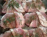 A picture of step 4 of Herb/spice stuffed and encrusted bacon wrapped pork loin.