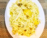 A picture of step 4 of Aloo matar ki tehari.