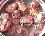 A picture of step 1 of Seppankilangu or Arbi fry.
