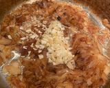 A picture of step 3 of Roasted heirloom and caramelized onion red sauce.