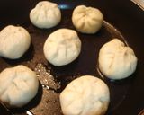 A picture of step 8 of Steamed Meat Buns in a Frying Pan.
