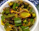 A picture of step 6 of Bhindi and Onion Fry with roasted cumin powder.