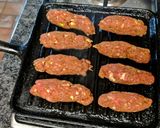 A picture of step 8 of Northern African Sausage.