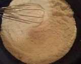 A picture of step 2 of Berry Peach Cobbler.