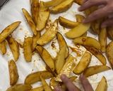 Foto del paso 3 de la receta: Patatas gajo especiadas al horno