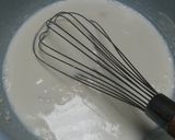 A picture of step 2 of Easy Rich Cream Stew in a Le Creuset Pot.