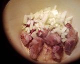 A picture of step 6 of Italian style pork and beans.
