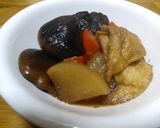 A picture of step 7 of Simmered Daikon Radish, Carrot, Shiitake Mushrooms and Aburaage.