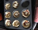 A picture of step 5 of Cheesy Meatball Bites.