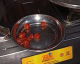 A picture of step 2 of Kaju ki burfi (cherries 🍒 and rose flavour) and laddoo (pan flavour).