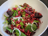 Salad with crispy Iberian ham and pomegranate