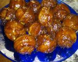 A picture of step 7 of Bacon wrapped cheese stuffed meatballs.