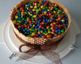 A picture of step 11 of M&M chocolate cake!.