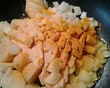 A picture of step 2 of Eggs potatoes and peas.