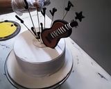 A picture of step 3 of Birthday cake music theme top on fondant guitar 🎸🎸🎸.