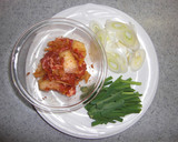 A picture of step 1 of Somen Noodles in Soup with Pork and Kimchi.