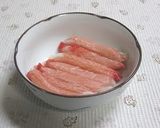 A picture of step 2 of Crab Sticks and Shimeji Mushroom Rice.