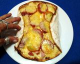 A picture of step 10 of Ladybirds Easy Pizza Threesome . Pizza , Pizza Wraps & Pizza Pinwheels ..
