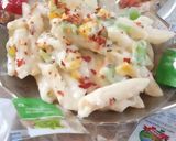 A picture of step 5 of Italian pasta with white sauce.