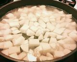 A picture of step 4 of Potato Chick-Pea Curry W/Garlic Roasted Cauliflower - Serve W/Basmati Rice & Cha.