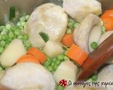 A picture of step 2 of Artichokes with peas.