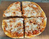 Foto del paso 12 de la receta Pizza Extra Fina con Pollo un Poco de Especias y Queso
