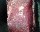A picture of step 1 of cornbeef brisket in sauerkraut.