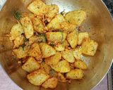 A picture of step 7 of Cheesey Spicy Garlic Potato.