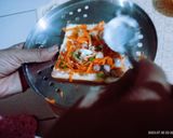 A picture of step 2 of Amul cheese spread vegetable sandwich.
