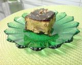 A picture of step 4 of Carrot and Nuts cake with chocolate cover.