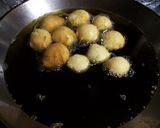 A picture of step 4 of Pancake Mix Fried Doughnuts.