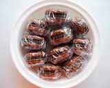 A picture of step 36 of Rich Bitter Chocolate Macarons.
