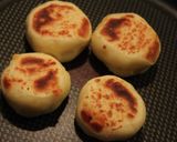 A picture of step 7 of Double Cheese Rice Flour and Potato Fritters in a Frying Pan.