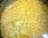 A picture of step 2 of Punjabi chholle with naan.