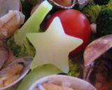 A picture of step 6 of Manila Clams and Broccoli with Garlic Steamed in Sake.