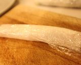 A picture of step 11 of California Rolls with Salmon and Cream Cheese.
