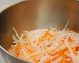 A picture of step 1 of Daikon Radish and Carrot Namasu Pickles.