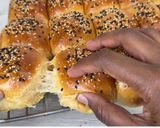 A picture of step 17 of Coconut Sesame Seeds Dinner Rolls.