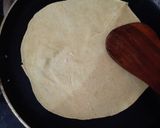 A picture of step 4 of Tortilla Wrap with egg and veggies.