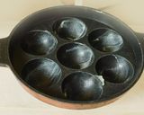 A picture of step 1 of Unni Appam aka Ghee Appam.