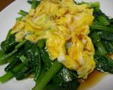 A picture of step 5 of Spinach with Soft-Cooked Eggs.