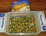 A picture of step 1 of Mike's 4 Onion 3 Pepper Bagel Spread.