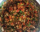 A picture of step 2 of Red and green chilli Thecha.
