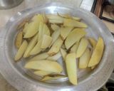 A picture of step 3 of Potato wedges.